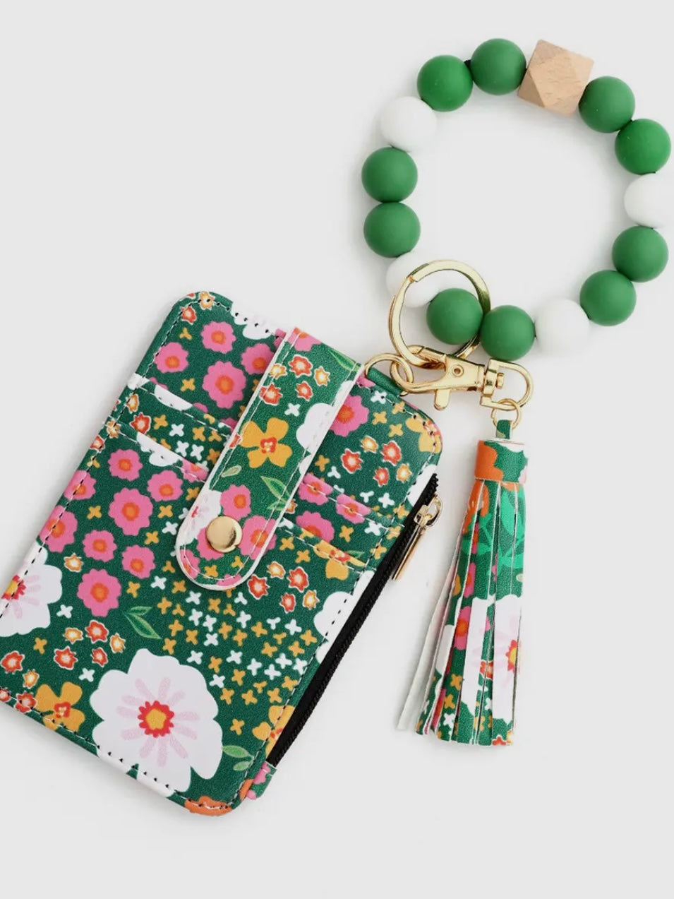 Floral wallet with a matching keychain on a white background