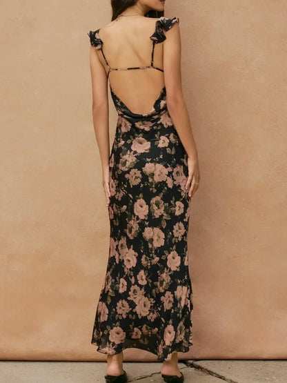 Woman wearing a floral dress with a beige background