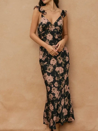 Woman wearing a floral dress against a beige background
