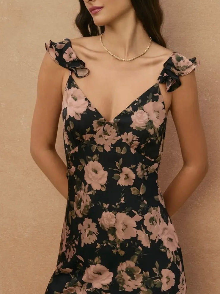 Woman wearing a floral dress against a beige background