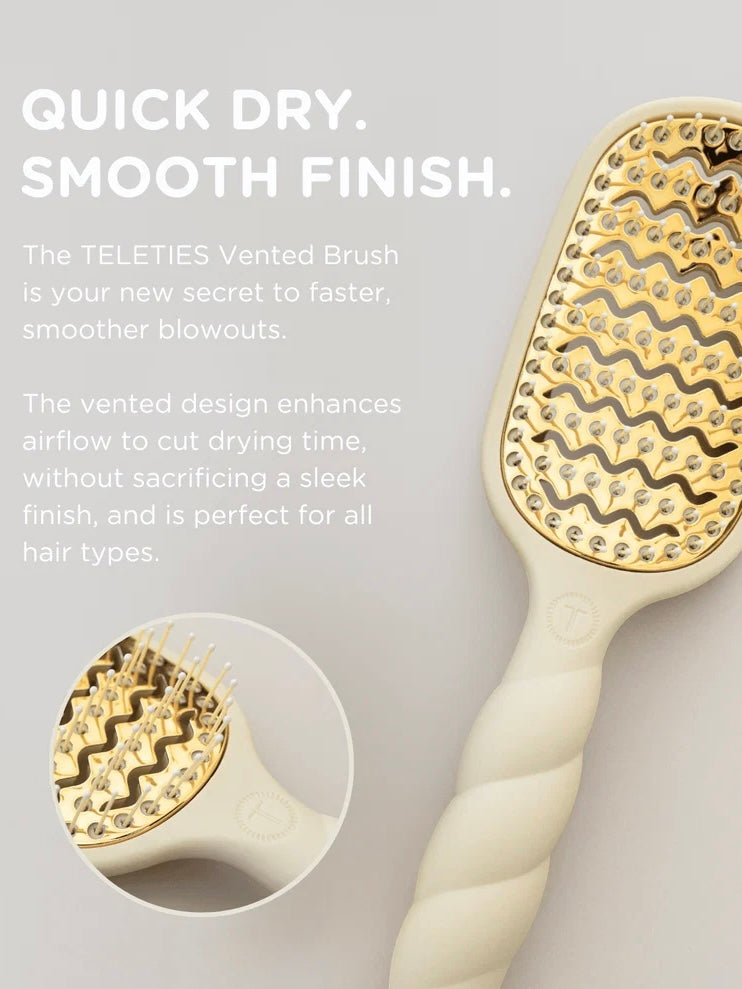 A cream-colored hairbrush with a gold vented metal bristle head, shown on a light gray background with promotional text and a circular inset detail of the bristle pattern.