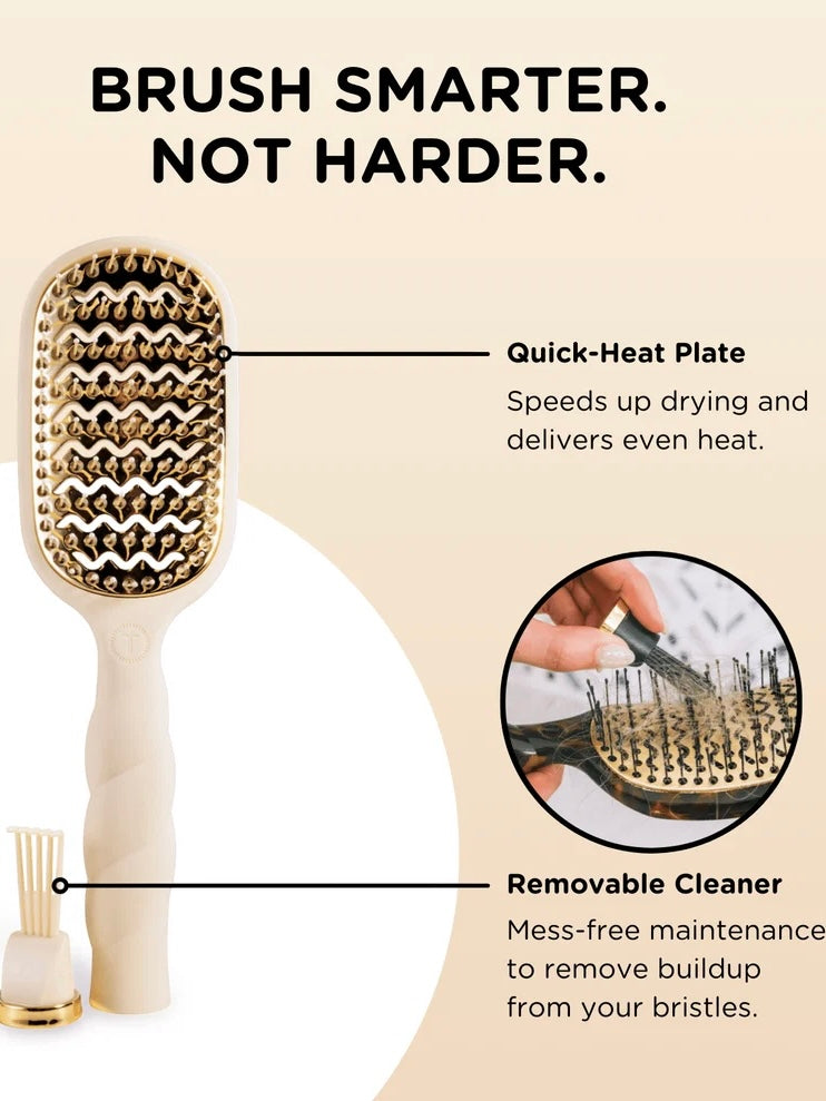 A hairbrush with a beige handle and gold-toned bristles, shown on a warm beige background with marketing text and callouts for a quick-heat plate and removable cleaner. A small inset circle shows a hand using the cleaner on the brush.
