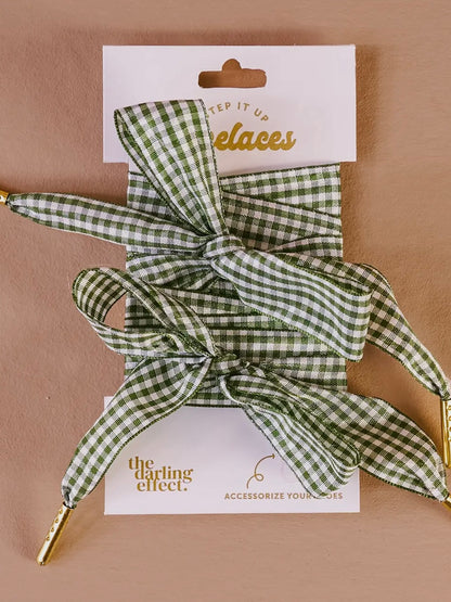 Green gingham dog lace with packaging on a brown background